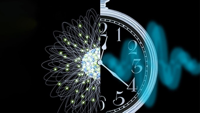 A split illustration shows a thorium nucleus alongside a clock.