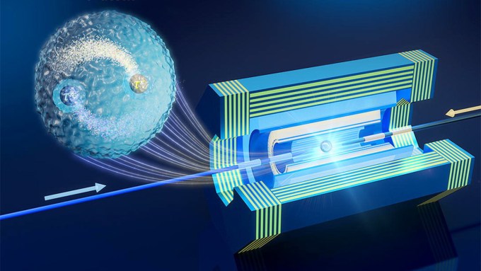 A swirl of two particles represents the tauonium atom in an illustration. The atom has emerged from a particle detector represented by a series of concentric cylinders, centered around a beam line where electrons and positrons enter from either side.