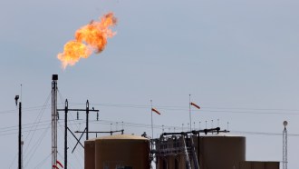 image of a flaming gas flare at an oil field in Texas